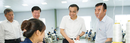 李克强赞环保企业理念：“化污泥为资源”